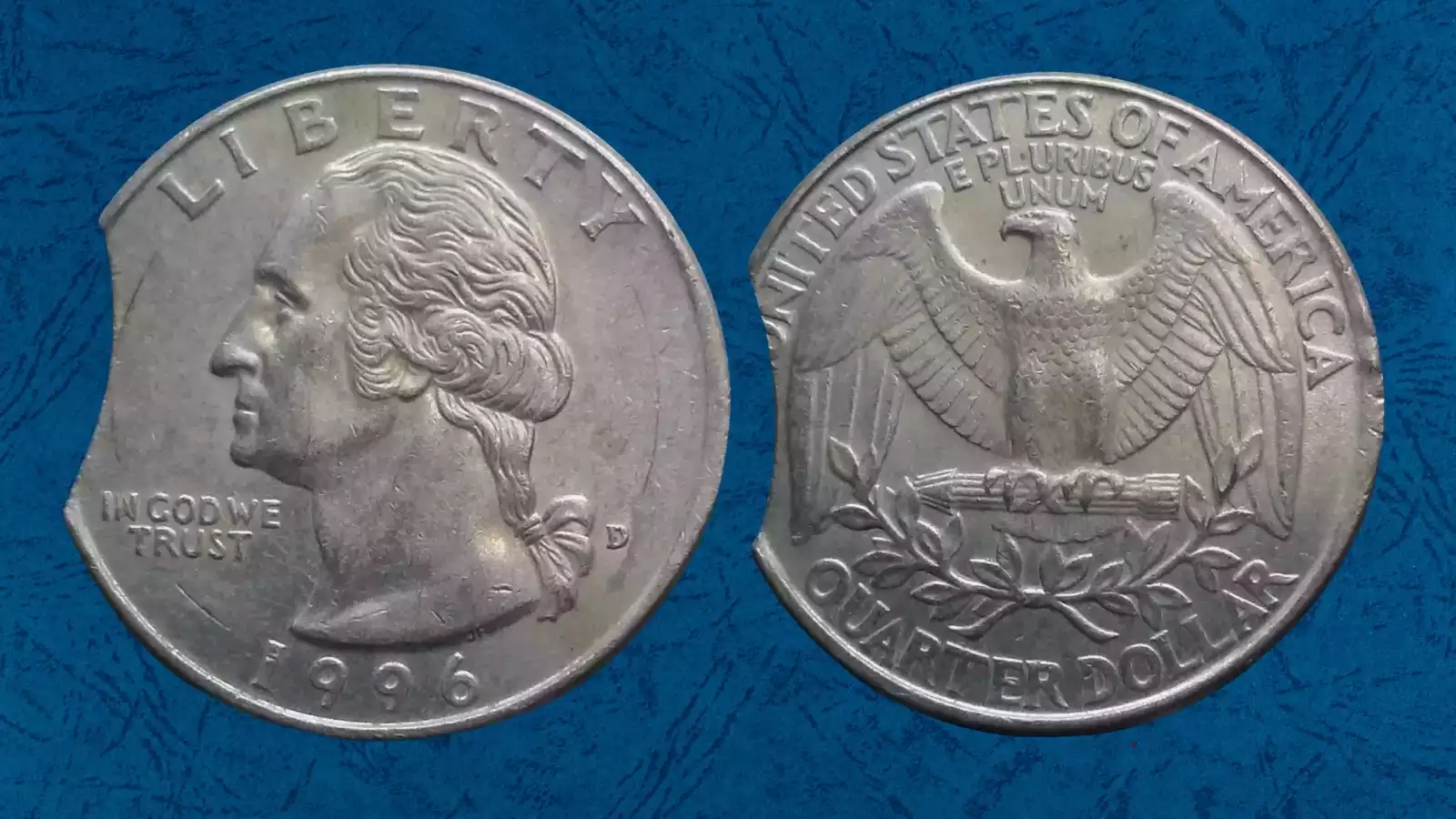 1996 quarter clipped planchet error showing curved arc missing from edge of the coin