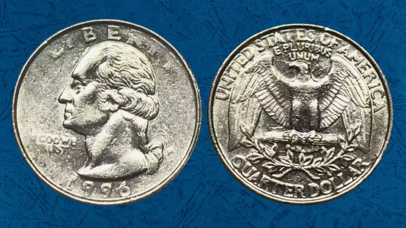 1996 quarter struck-through grease error showing weak missing design detail in localized area